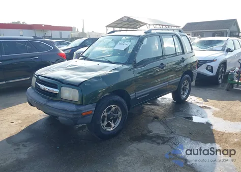 1999 Chevrolet Tracker from USA, damaged, VIN 2CNBJ13C9X6928226